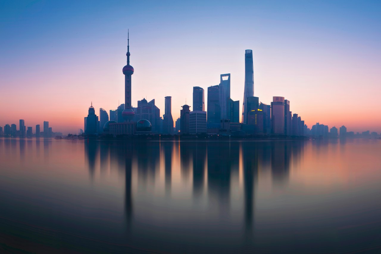 The Lujiazui skyline reflected in the Huangpu River at blue hour, Shanghai