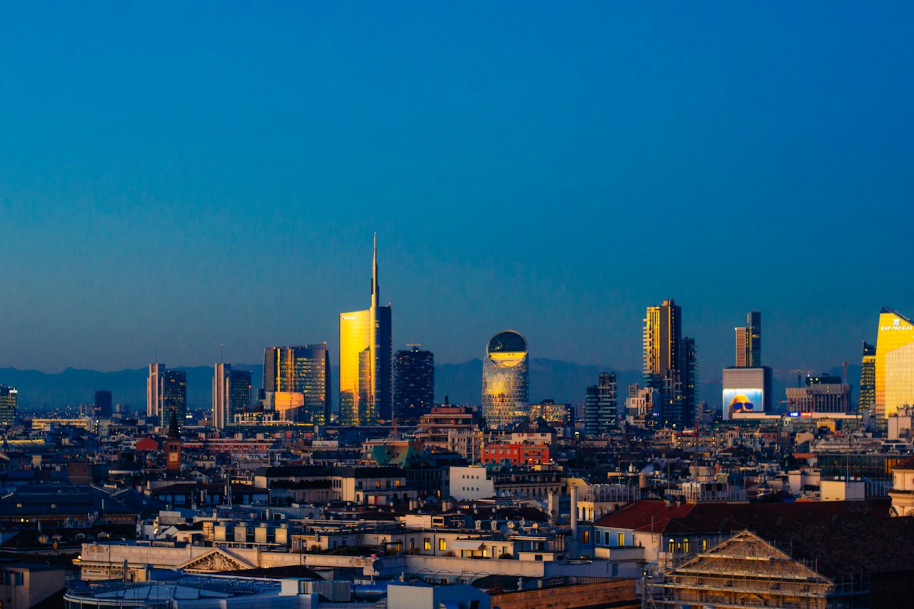 Milan's rooftops and the Porta Nuova towers at blue hour