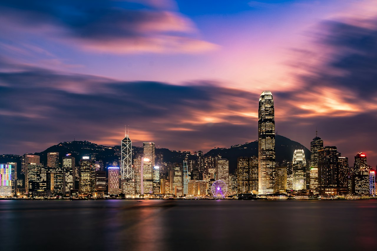 Victoria Harbour and the Hong Kong Island skyline at dusk